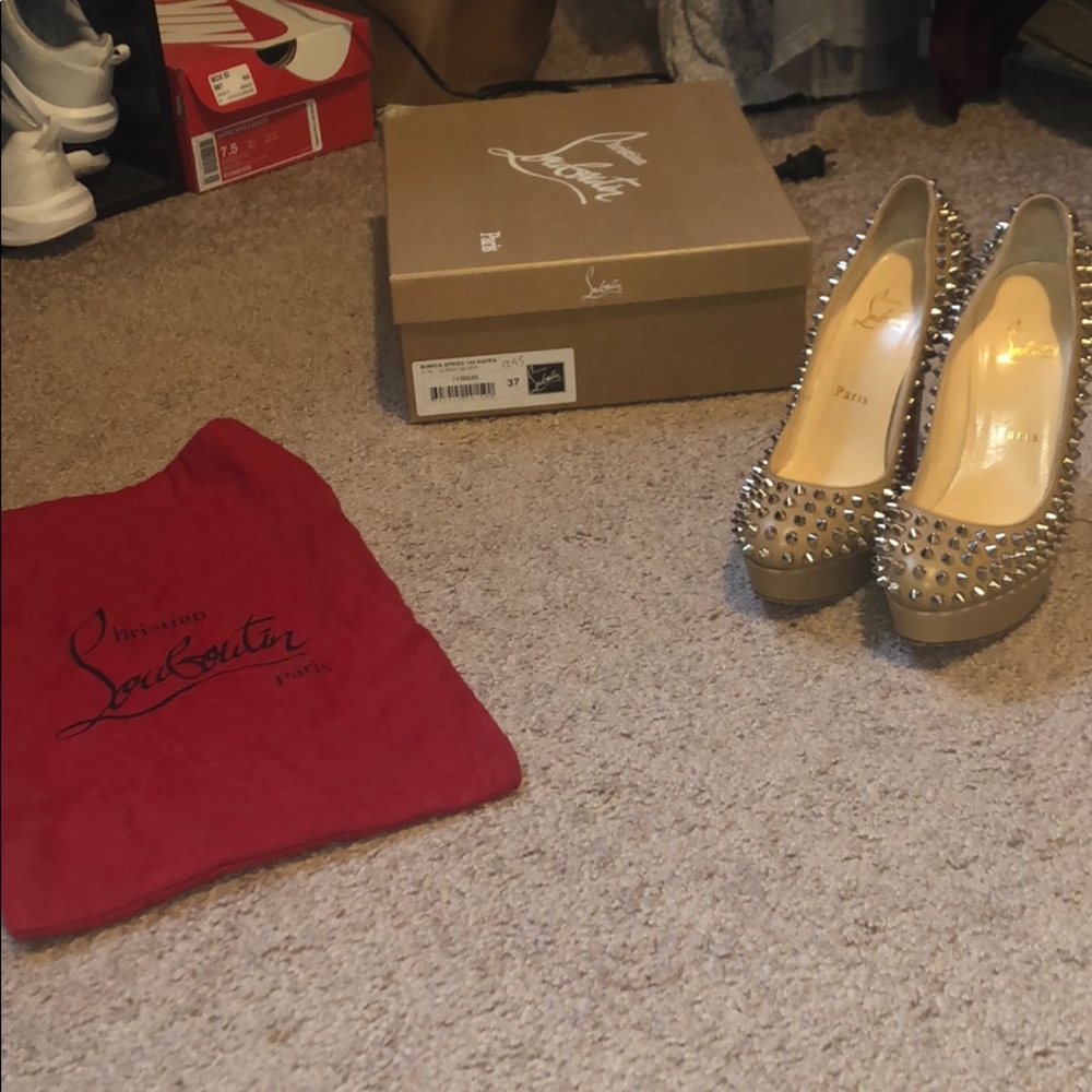 Bianca spiked red bottoms!